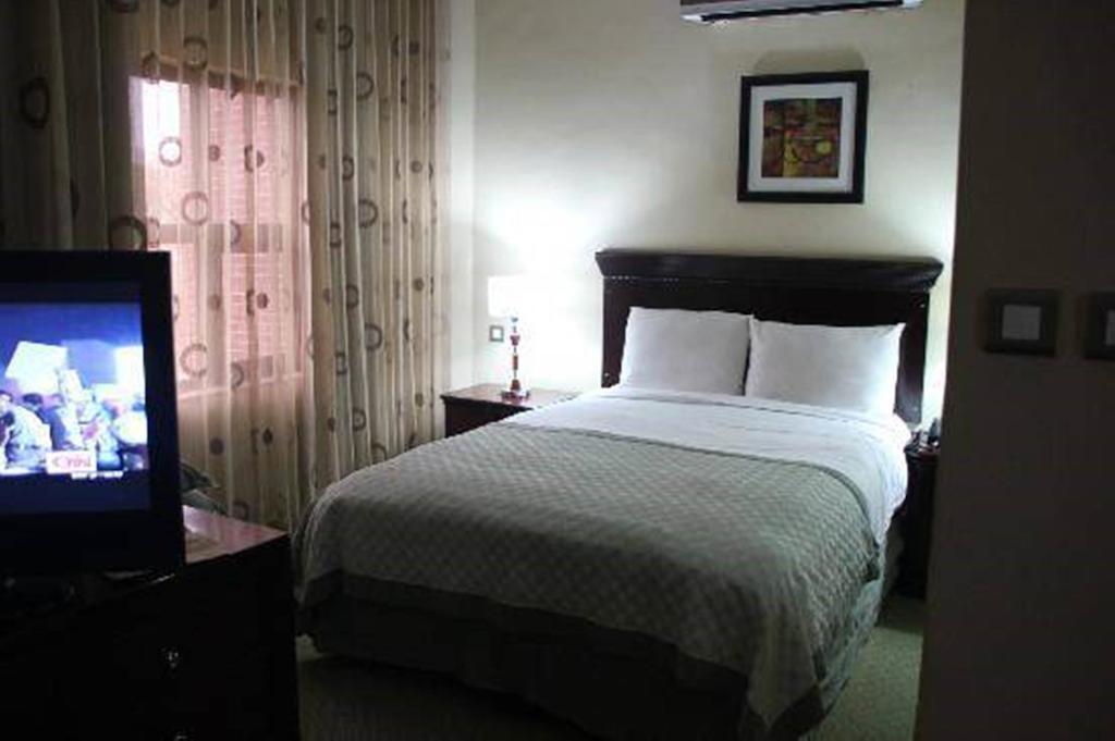Denis Hotel Abuja Mobushipe Værelse billede